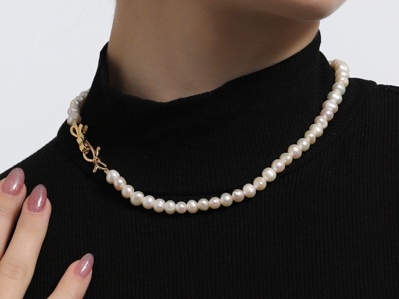 The Magical Pairing of Cozy Knits and Pearl Necklace